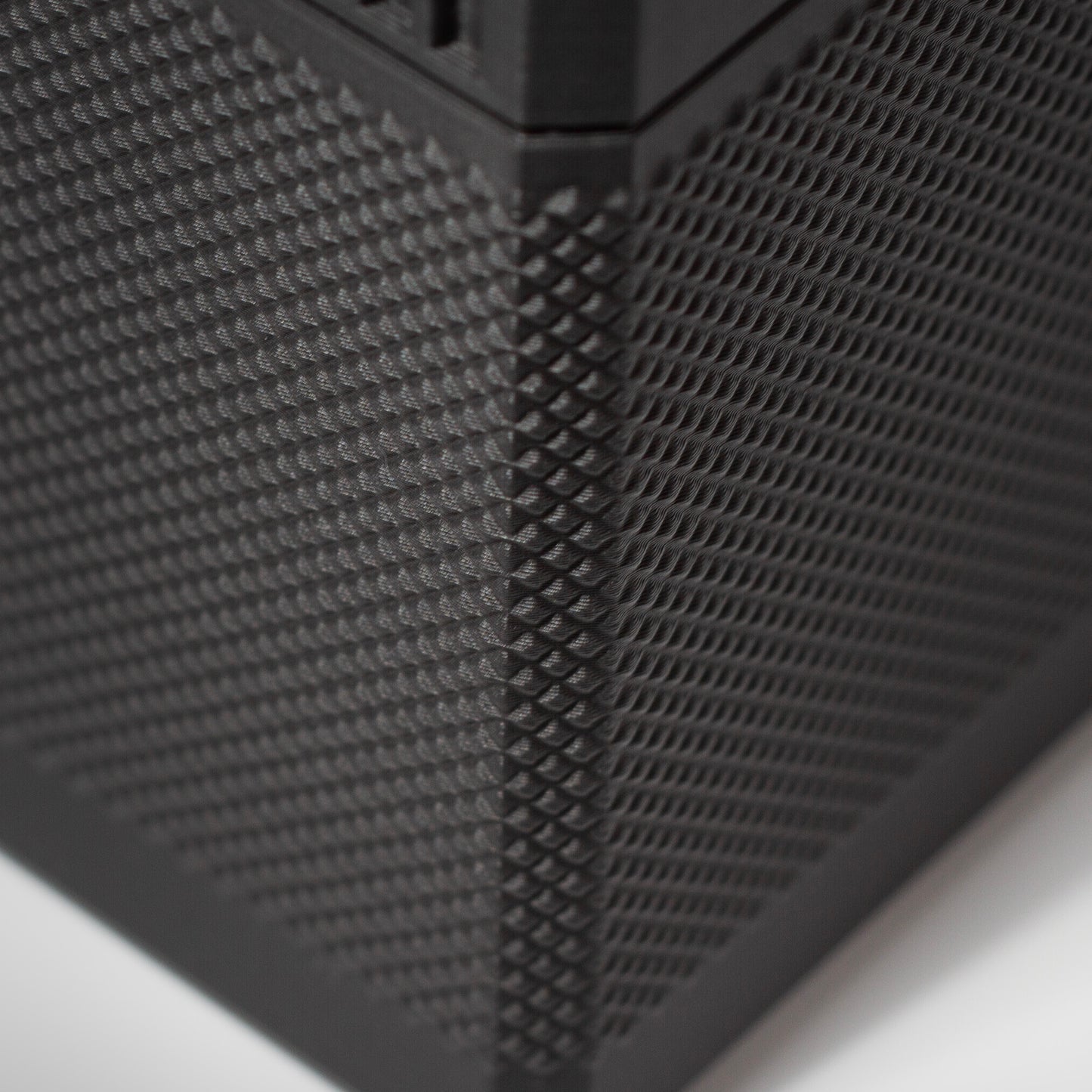 Close-up of the textured grip on the Blackout MTG Commander deck box