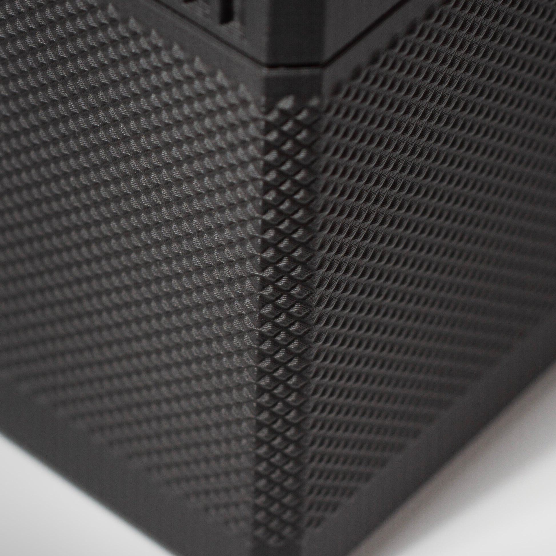 Close-up of the textured grip on the Blackout MTG Commander deck box